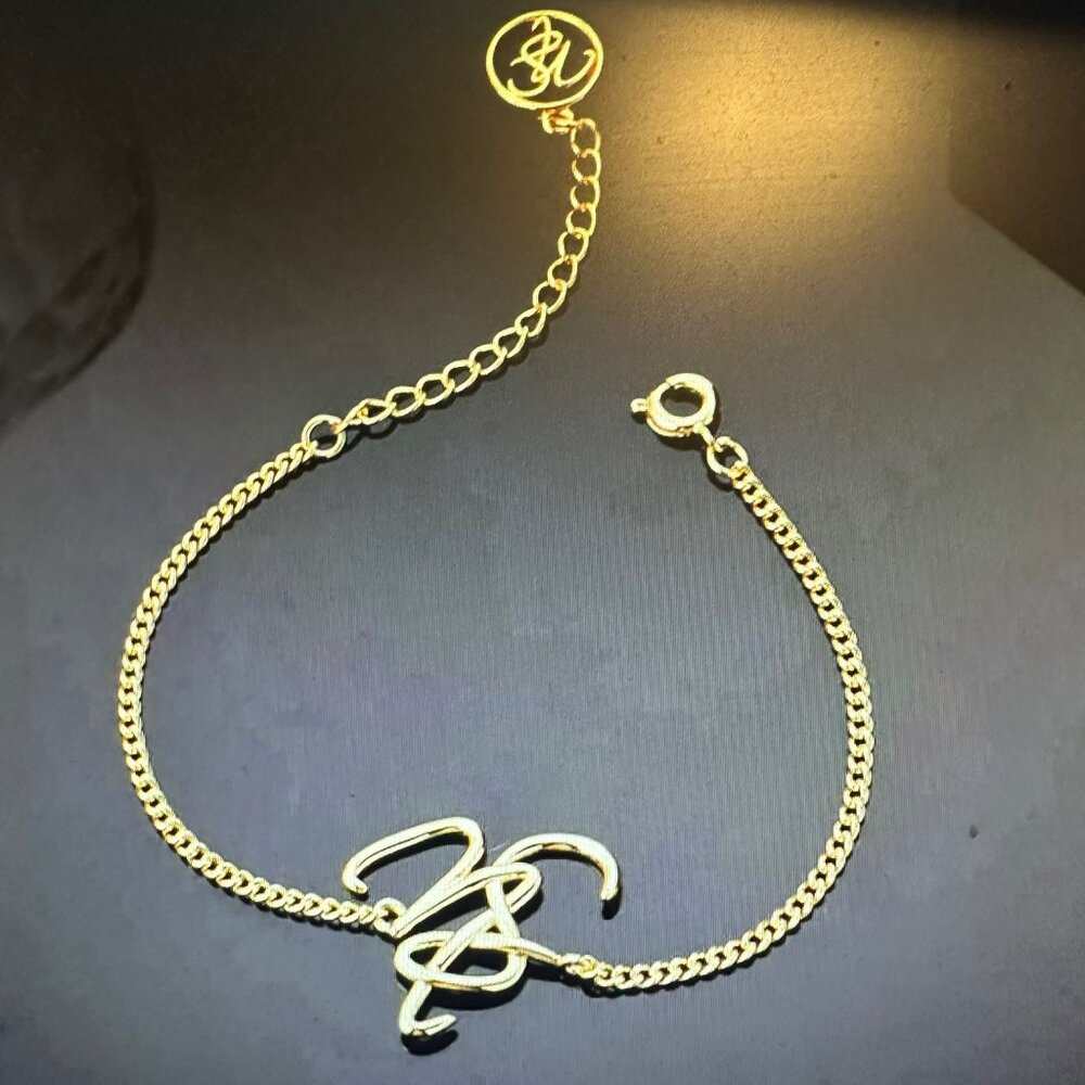 Natasha Somalia Gold Plated Signature Bracelet - NWOT
